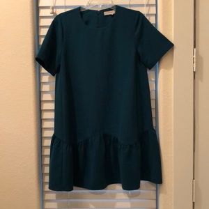 Teal sheath dress with ruffle bottom!